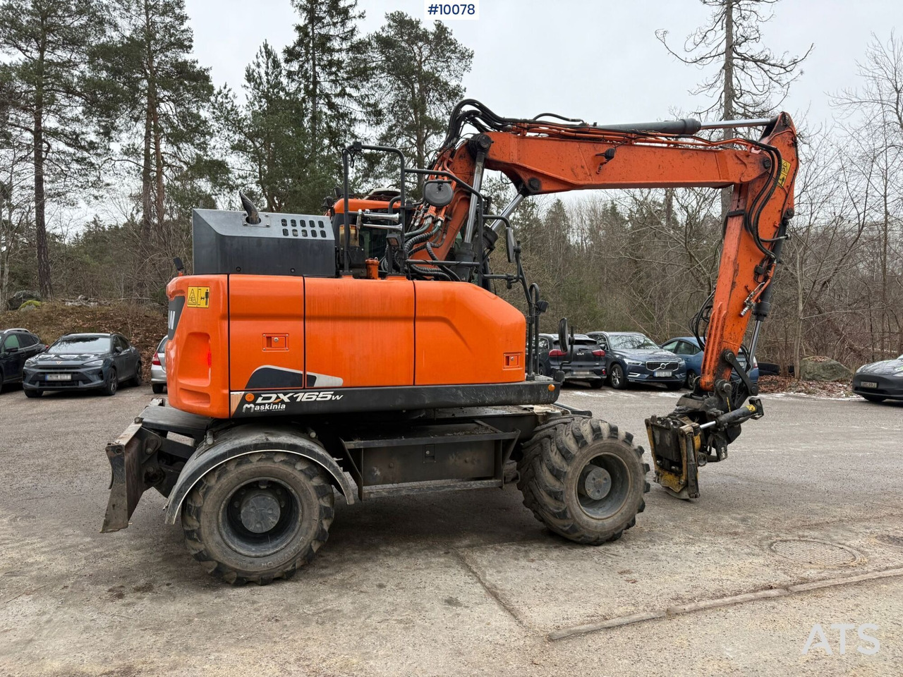 Doosan DX165W-5 Wheeled excavator (VIDEO) - Pelle sur pneus: photos 4 Doosan DX165W-5 Wheeled excavator (VIDEO) - Pelle sur pneus: photos 4