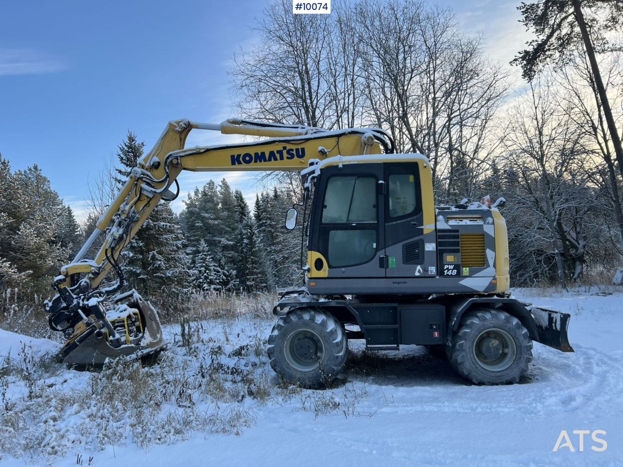 Komatsu PW148 Wheeled excavator with rotor and buckets - Pelle sur pneus: photos 1 Komatsu PW148 Wheeled excavator with rotor and buckets - Pelle sur pneus: photos 1