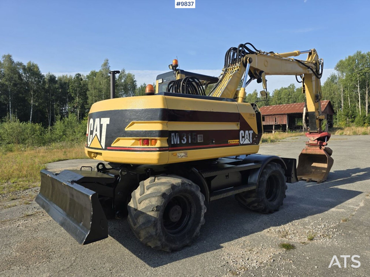 Wheel Excavator CAT M315 (See Video) - Pelle sur pneus: photos 3 Wheel Excavator CAT M315 (See Video) - Pelle sur pneus: photos 3