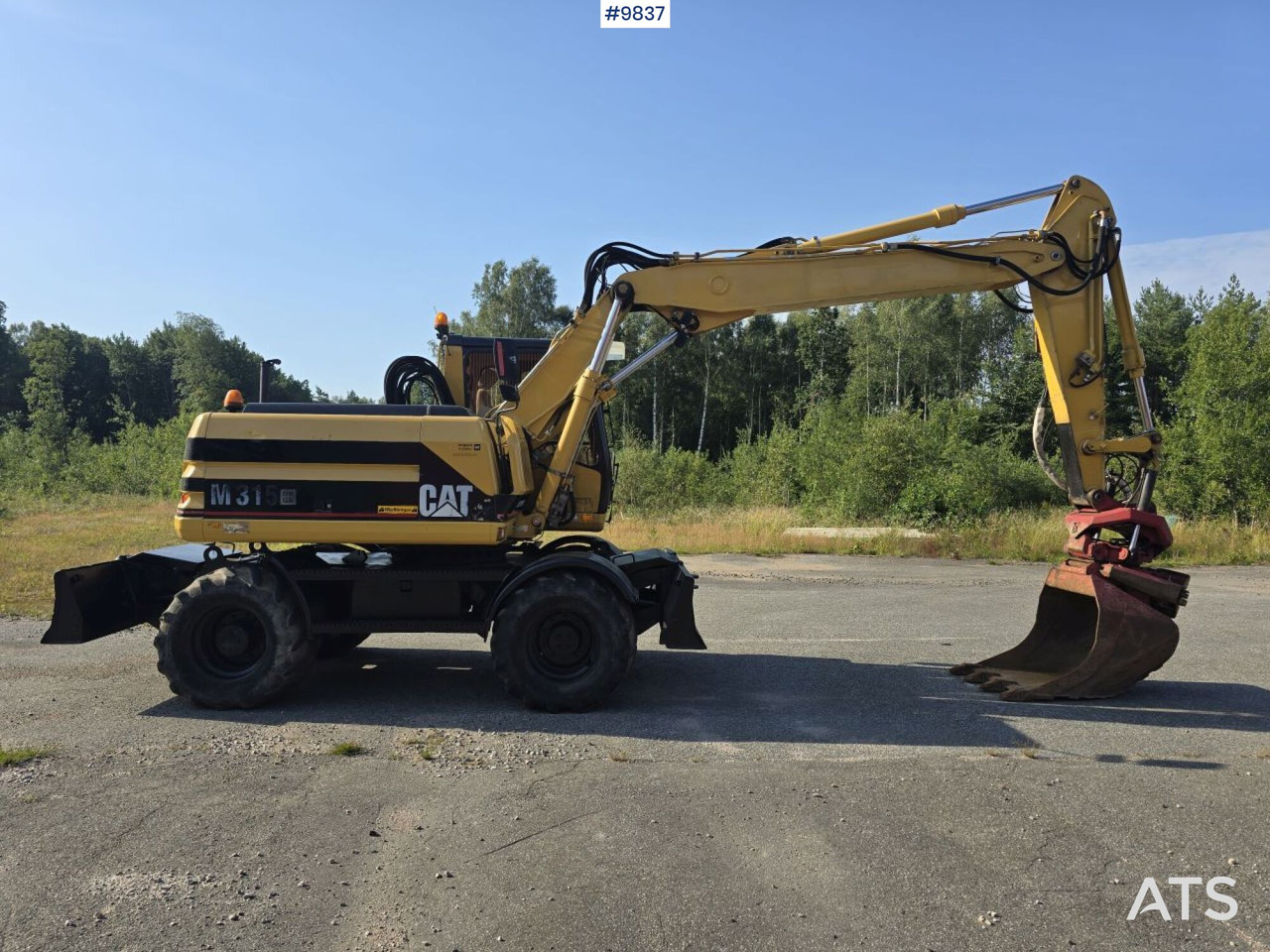 Wheel Excavator CAT M315 (See Video) - Pelle sur pneus: photos 2 Wheel Excavator CAT M315 (See Video) - Pelle sur pneus: photos 2