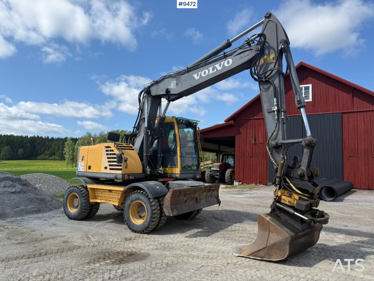 Wheel excavator Volvo EW160B, Tiltrotator - Pelle sur pneus: photos 1 Wheel excavator Volvo EW160B, Tiltrotator - Pelle sur pneus: photos 1