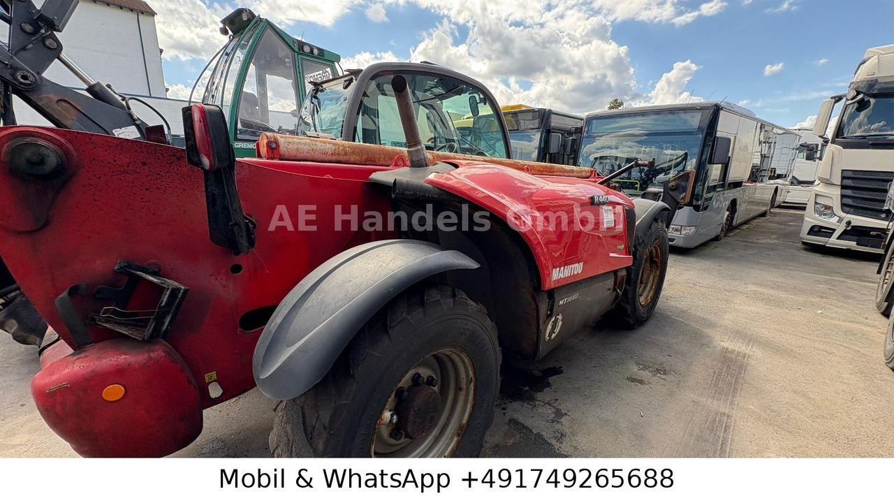 Manitou MT 1440 Comfort *1800Std./4To./14m/Gabel - Chariot télescopique: photos 3 Manitou MT 1440 Comfort *1800Std./4To./14m/Gabel - Chariot télescopique: photos 3