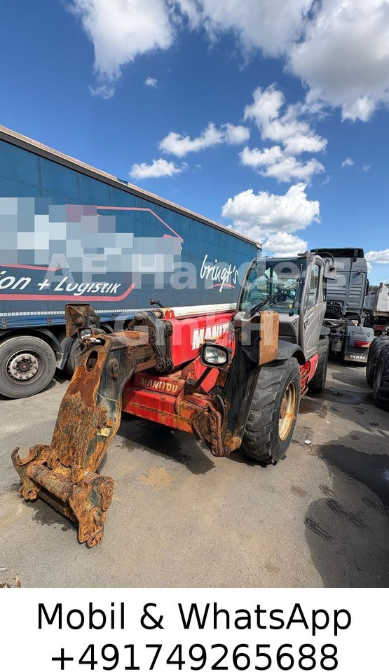 Manitou MT 1440 Comfort *1800Std./4To./14m/Gabel - Chariot télescopique: photos 1 Manitou MT 1440 Comfort *1800Std./4To./14m/Gabel - Chariot télescopique: photos 1