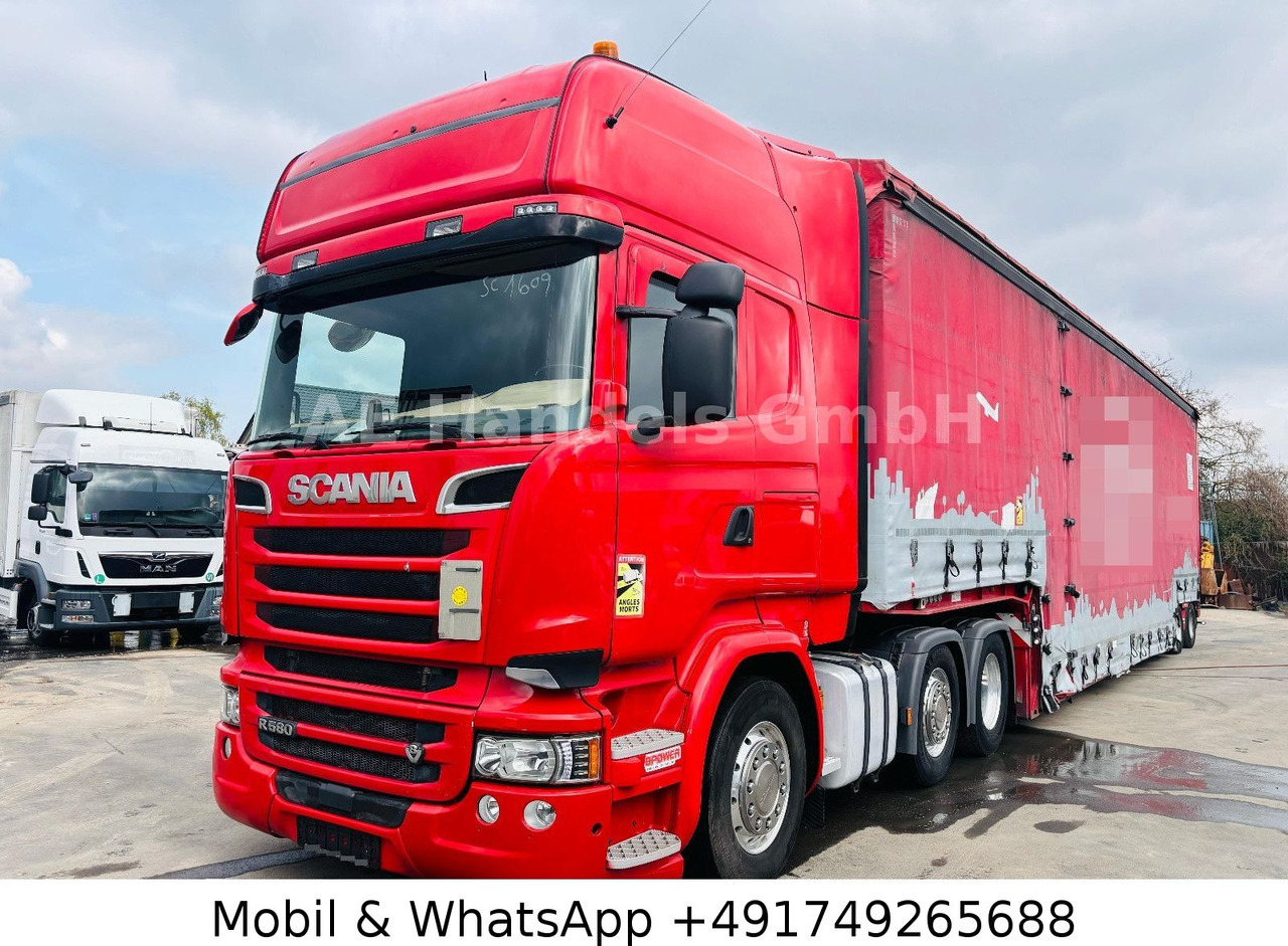 Scania R580 V8 TopLine BL 6x2*Retarder/Standklima/Alcoa - Tracteur routier: photos 1 Scania R580 V8 TopLine BL 6x2*Retarder/Standklima/Alcoa - Tracteur routier: photos 1