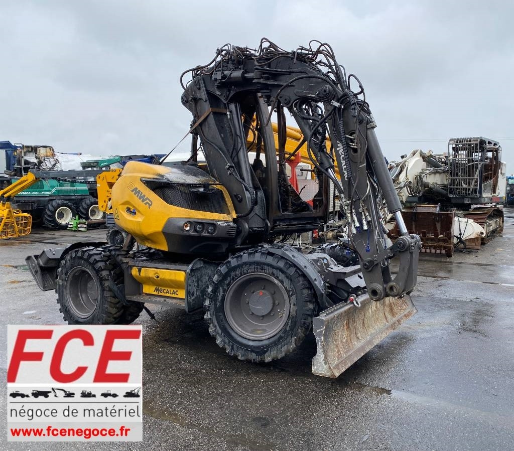 Mecalac 9 MWR / 1er Main Origine Française endommagée - Pelle sur pneus: photos 1 Mecalac 9 MWR / 1er Main Origine Française endommagée - Pelle sur pneus: photos 1