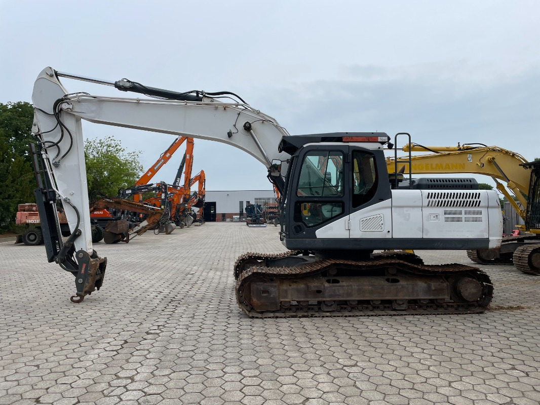 Doosan DX225LC-5 - Pelle sur chenille: photos 2 Doosan DX225LC-5 - Pelle sur chenille: photos 2