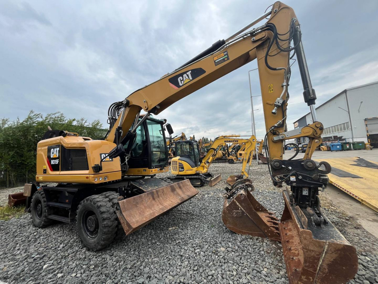 CAT M315F - Pelle sur pneus: photos 2 CAT M315F - Pelle sur pneus: photos 2