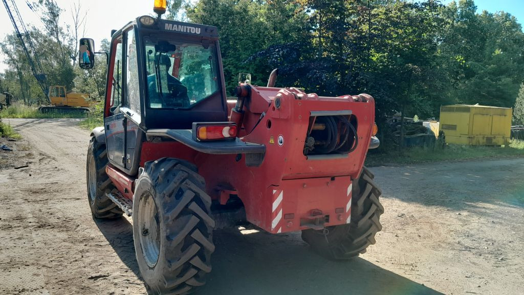 MANITOU MT 1235S - Chargeuse sur pneus télescopique: photos 3 MANITOU MT 1235S - Chargeuse sur pneus télescopique: photos 3