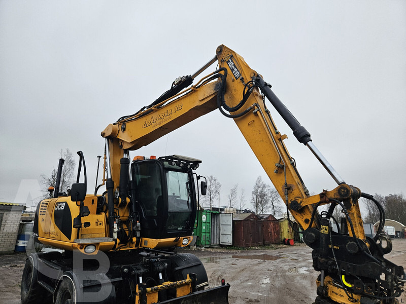 Pelle sur pneus JCB JS 145 W: photos 15