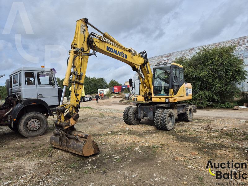Komatsu PW160-7 - Pelle sur pneus: photos 1 Komatsu PW160-7 - Pelle sur pneus: photos 1