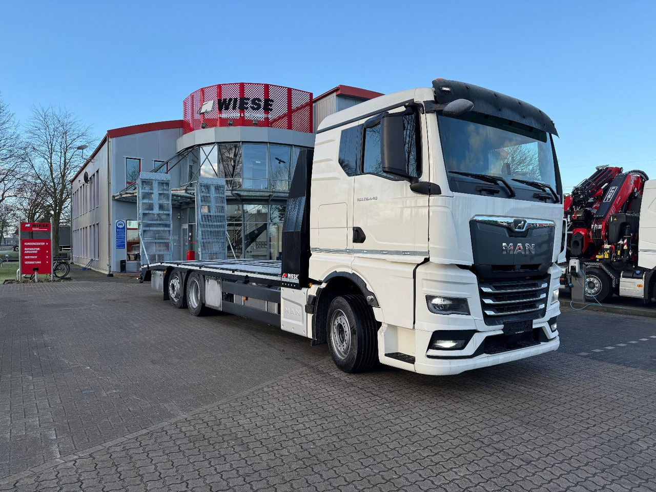 MAN Baumaschinen-  Arbeitsbühnentransporter Rampen - Camion porte-voitures: photos 2 MAN Baumaschinen-  Arbeitsbühnentransporter Rampen - Camion porte-voitures: photos 2