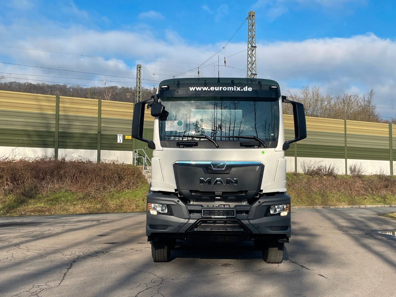 MAN TGS 41.400 8x4 / EuromixMTP EM 12m³ R / EURO 2 - Camion malaxeur: photos 2 MAN TGS 41.400 8x4 / EuromixMTP EM 12m³ R / EURO 2 - Camion malaxeur: photos 2