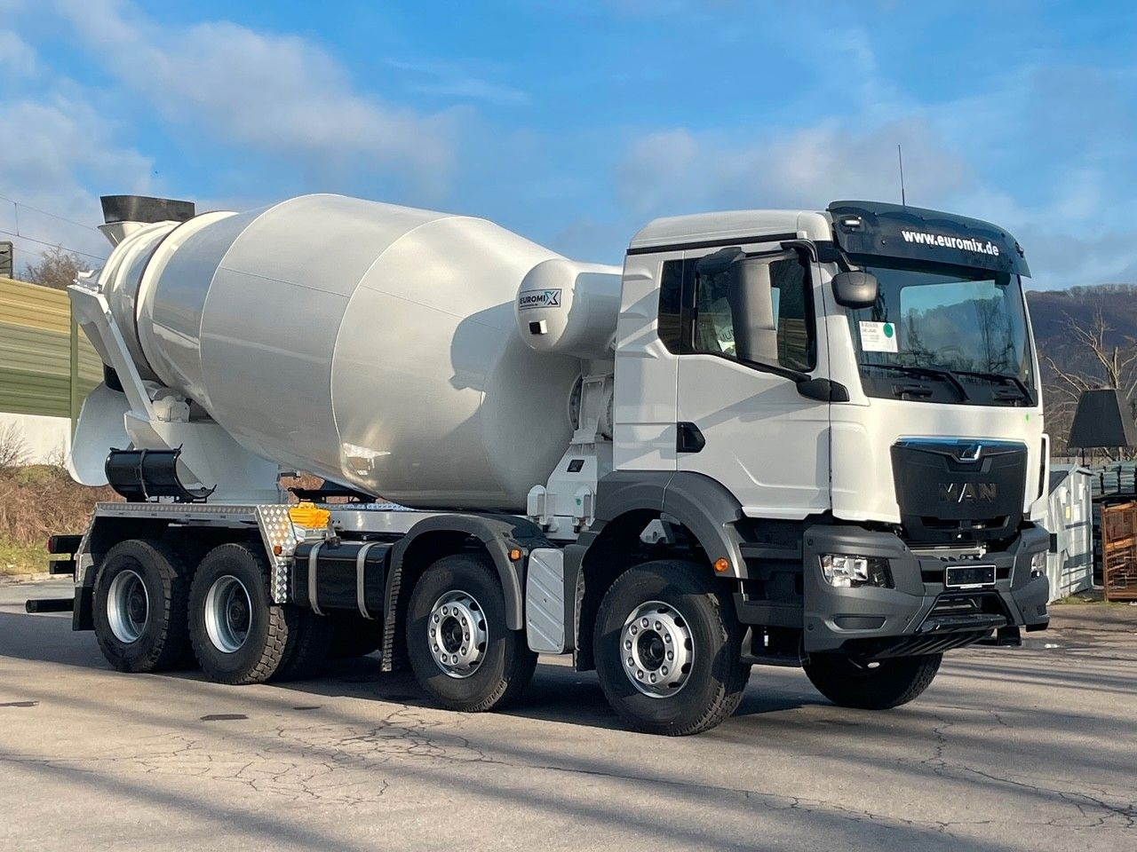 MAN TGS 41.400 8x4 / EuromixMTP EM 12m³ R / EURO 2 - Camion malaxeur: photos 1 MAN TGS 41.400 8x4 / EuromixMTP EM 12m³ R / EURO 2 - Camion malaxeur: photos 1