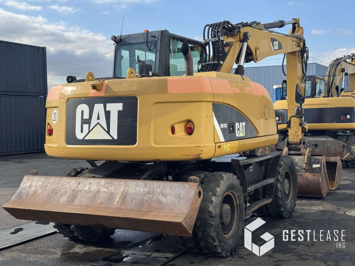 Caterpillar M313D - Pelle sur pneus: photos 3 Caterpillar M313D - Pelle sur pneus: photos 3