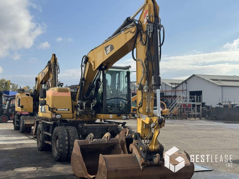 Caterpillar M313D - Pelle sur pneus: photos 4 Caterpillar M313D - Pelle sur pneus: photos 4