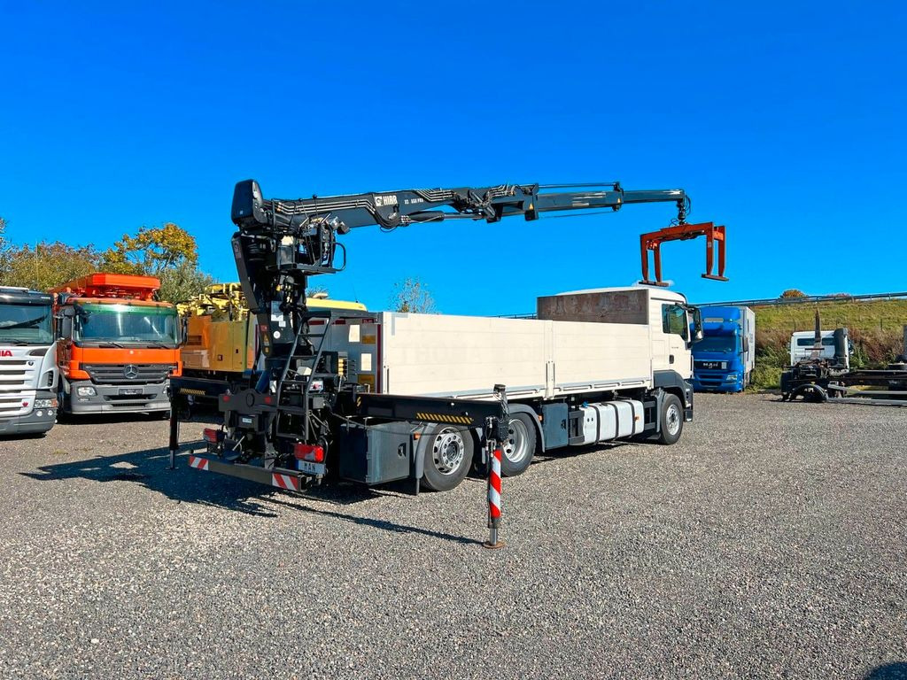 MAN 26.480 6X2 Baustoff mit Kran HIAB Top Zustand - Camion grue, Camion plateau: photos 1 MAN 26.480 6X2 Baustoff mit Kran HIAB Top Zustand - Camion grue, Camion plateau: photos 1