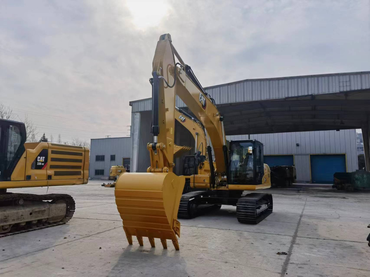 Caterpillar 323GX - Pelle sur chenille: photos 1 Caterpillar 323GX - Pelle sur chenille: photos 1