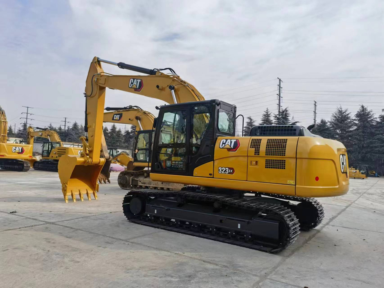 Caterpillar 323GX - Pelle sur chenille: photos 5 Caterpillar 323GX - Pelle sur chenille: photos 5
