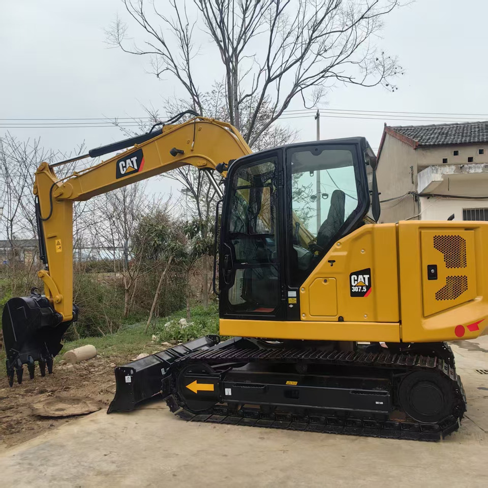 Engins de chantier Caterpillar 307.5: photos 11