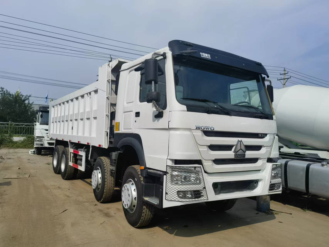 Sinotruk HOWO 375 8*4 Dump truck - Camion benne: photos 1 Sinotruk HOWO 375 8*4 Dump truck - Camion benne: photos 1