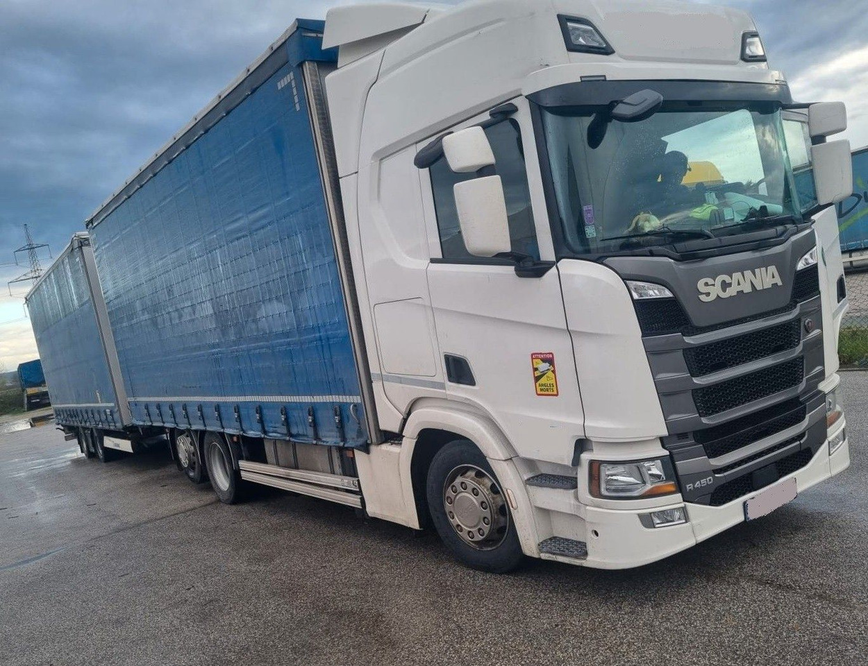Scania R450 6x2 tandem jumbo - Camion à rideaux coulissants: photos 1 Scania R450 6x2 tandem jumbo - Camion à rideaux coulissants: photos 1