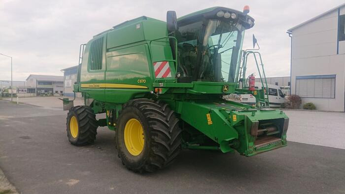John Deere C 670 - Moissonneuse-batteuse: photos 1 John Deere C 670 - Moissonneuse-batteuse: photos 1