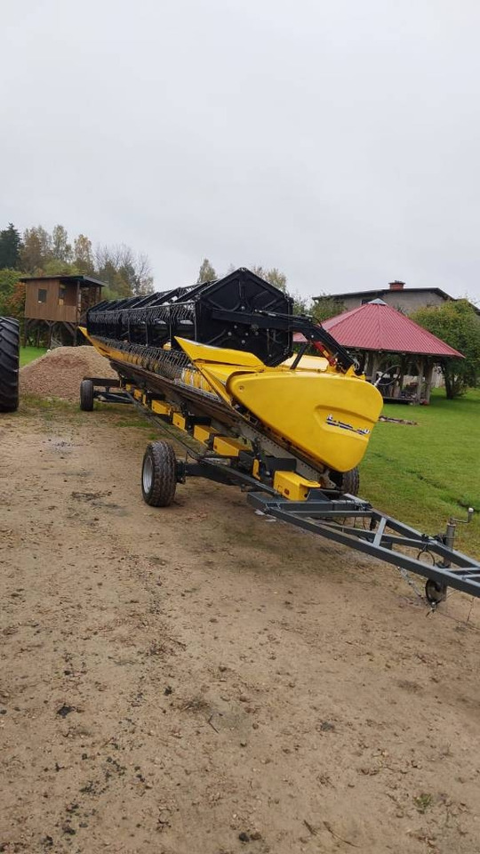 New Holland CR 9.90 - Moissonneuse-batteuse: photos 5 New Holland CR 9.90 - Moissonneuse-batteuse: photos 5
