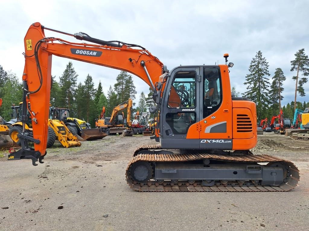 Doosan DX140LCR-5 - Pelle sur chenille: photos 1 Doosan DX140LCR-5 - Pelle sur chenille: photos 1