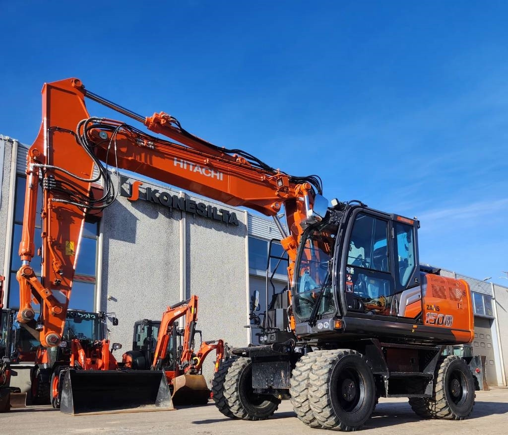 Hitachi ZX150W-7 STAGE 5 - Pelle sur pneus: photos 1 Hitachi ZX150W-7 STAGE 5 - Pelle sur pneus: photos 1