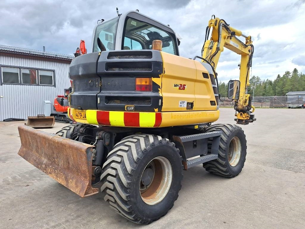 New Holland MH2.6 ENGCON PIHDEILLÄ - Pelle sur pneus: photos 4 New Holland MH2.6 ENGCON PIHDEILLÄ - Pelle sur pneus: photos 4