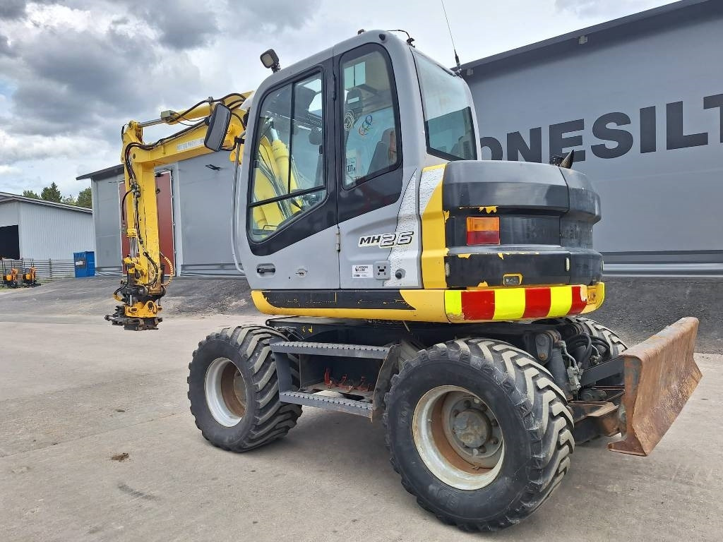 New Holland MH2.6 ENGCON PIHDEILLÄ - Pelle sur pneus: photos 2 New Holland MH2.6 ENGCON PIHDEILLÄ - Pelle sur pneus: photos 2