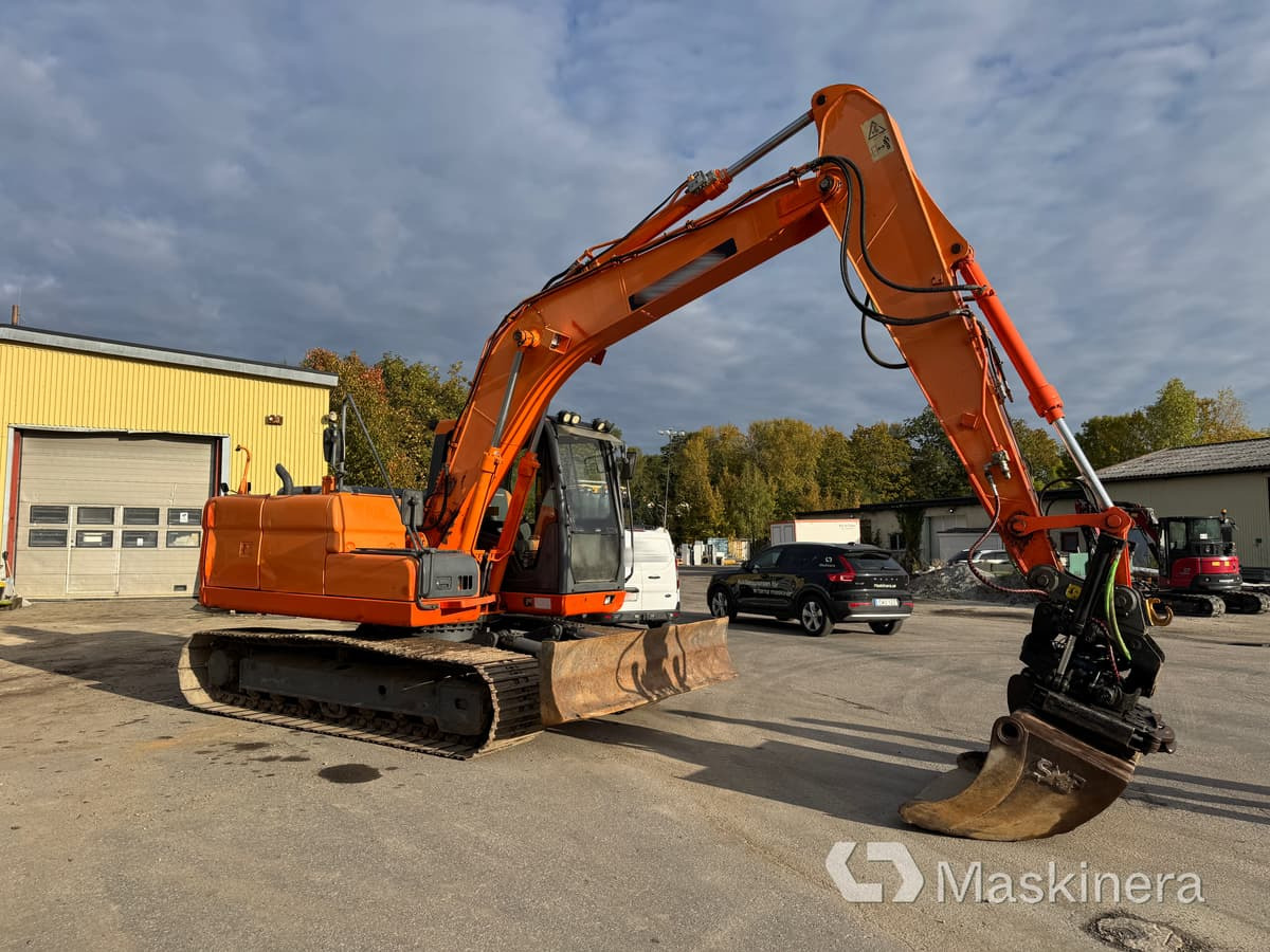 Grävmaskin Doosan DX140LC - Pelle sur chenille: photos 4 Grävmaskin Doosan DX140LC - Pelle sur chenille: photos 4