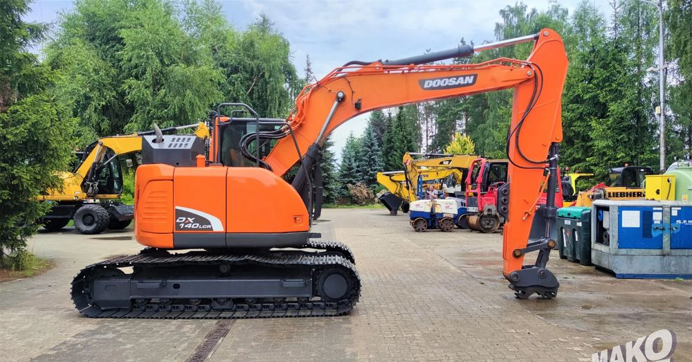 Doosan DX140LCR-5 - Pelle sur chenille: photos 5 Doosan DX140LCR-5 - Pelle sur chenille: photos 5