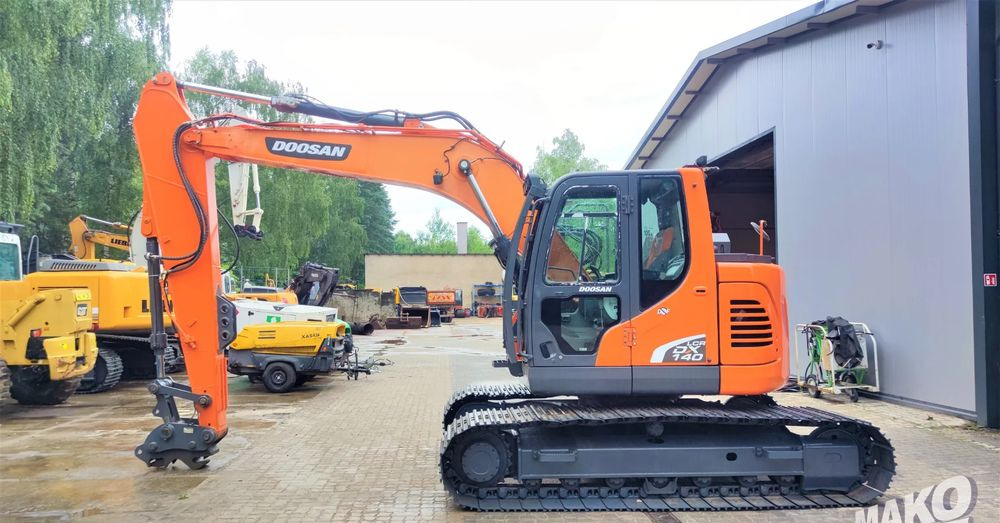 Doosan DX140LCR-5 - Pelle sur chenille: photos 1 Doosan DX140LCR-5 - Pelle sur chenille: photos 1