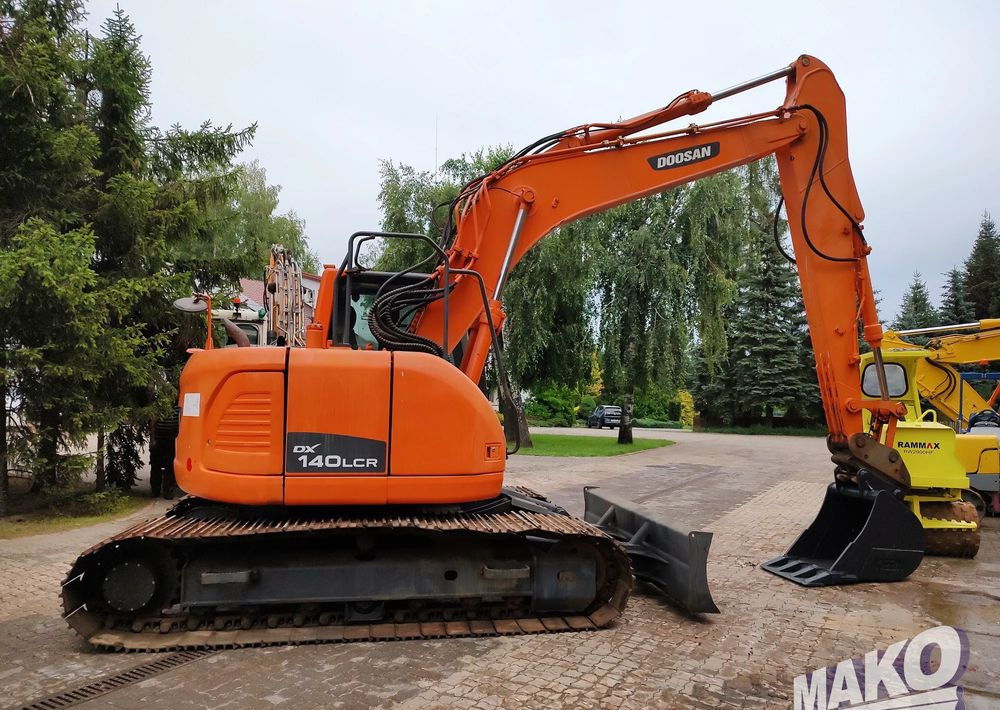 Doosan DX140LCR - Pelle sur chenille: photos 5 Doosan DX140LCR - Pelle sur chenille: photos 5