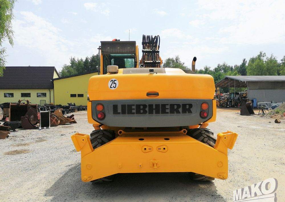 Liebherr A 314 Litronic - Pelle sur pneus: photos 4 Liebherr A 314 Litronic - Pelle sur pneus: photos 4