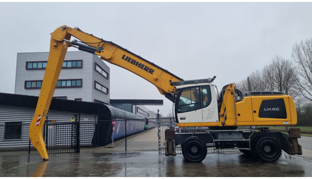 Liebherr LH 40 M Industry Litronic - Pelle de manutention: photos 1 Liebherr LH 40 M Industry Litronic - Pelle de manutention: photos 1