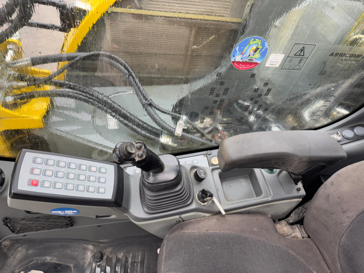 Pelle sur pneus LIEBHERR 910 Compact Litronic Powertilt: photos 18