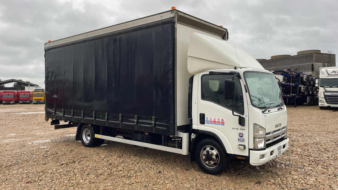 Isuzu N75 190 - Camion à rideaux coulissants: photos 1 Isuzu N75 190 - Camion à rideaux coulissants: photos 1