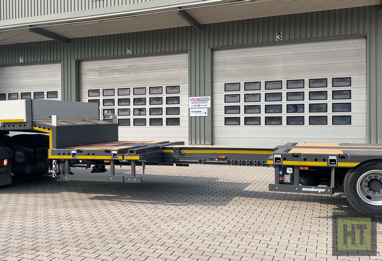 Meusburger 3-Achs-Tele-Semi mit 1 Paar Radmulden und hydr. Rampen - Semi-remorque surbaissé: photos 4 Meusburger 3-Achs-Tele-Semi mit 1 Paar Radmulden und hydr. Rampen - Semi-remorque surbaissé: photos 4