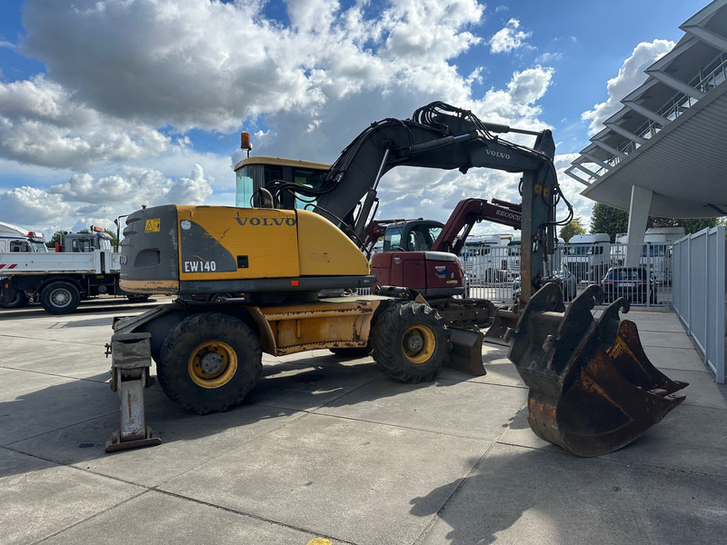 Volvo EW140 - Pelle sur pneus: photos 5 Volvo EW140 - Pelle sur pneus: photos 5