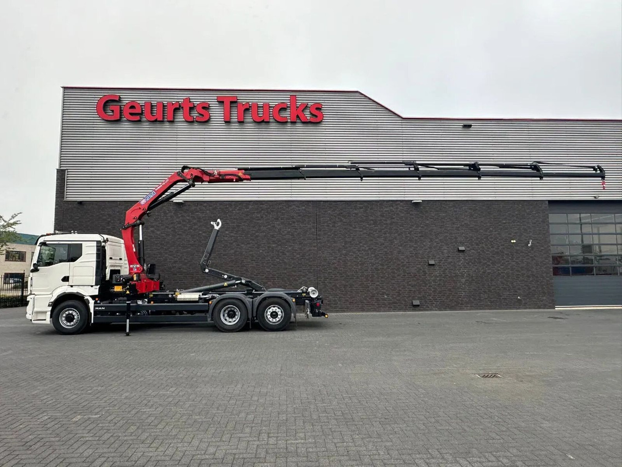 MAN TGS 26.520 6X4H-4 BL NEW MODEL + MEILLER HAAKARM - Camion ampliroll, Camion grue: photos 1 MAN TGS 26.520 6X4H-4 BL NEW MODEL + MEILLER HAAKARM - Camion ampliroll, Camion grue: photos 1