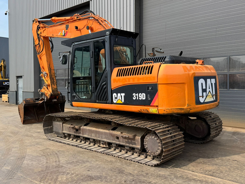 Caterpillar 319DL - Pelle sur chenille: photos 2 Caterpillar 319DL - Pelle sur chenille: photos 2