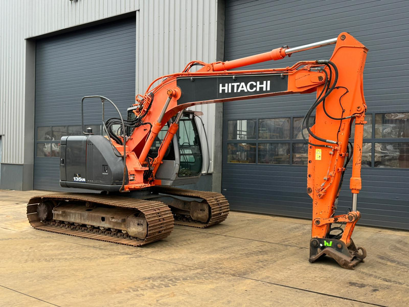 Pelle sur chenille Hitachi ZX135US: photos 7