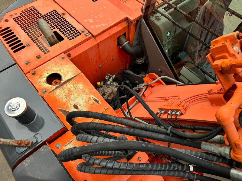 Pelle sur chenille Hitachi ZX135US: photos 20