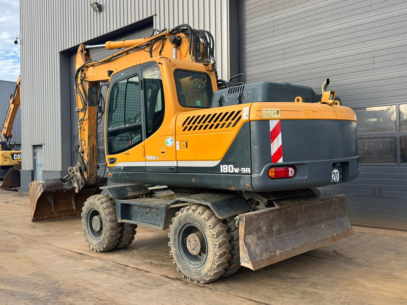 Hyundai Robex 180W-9A - Pelle sur pneus: photos 3 Hyundai Robex 180W-9A - Pelle sur pneus: photos 3