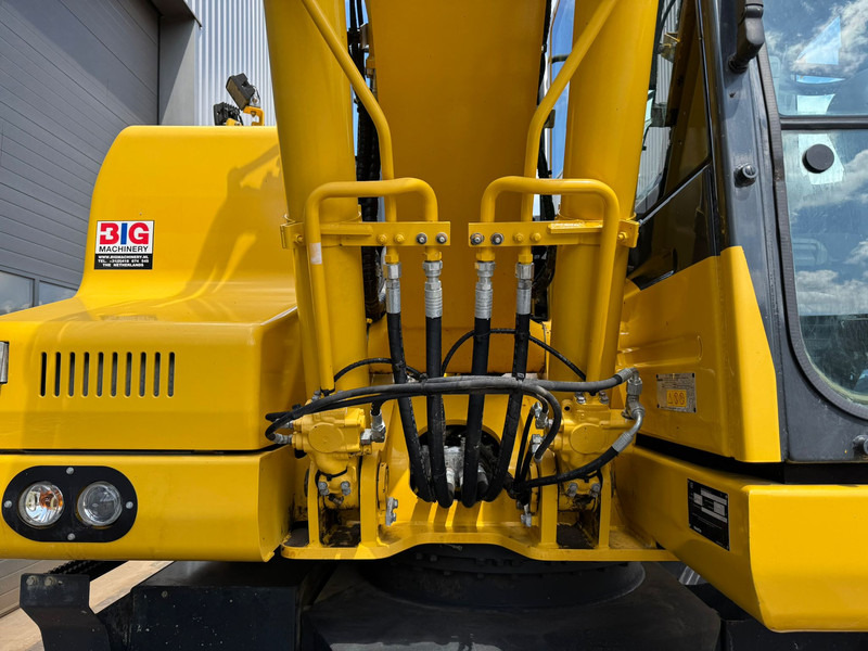 Pelle sur pneus Komatsu PW180-11: photos 18 Pelle sur pneus Komatsu PW180-11: photos 18