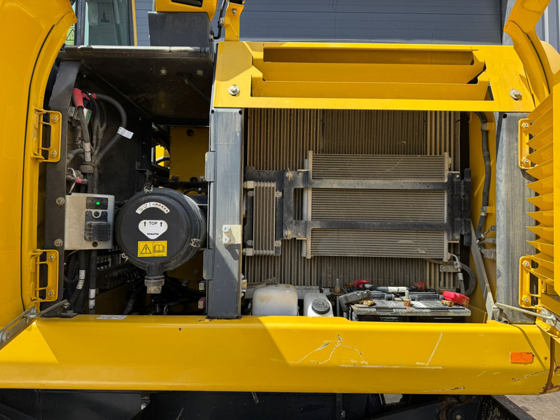 Pelle sur pneus Komatsu PW180-11: photos 15 Pelle sur pneus Komatsu PW180-11: photos 15