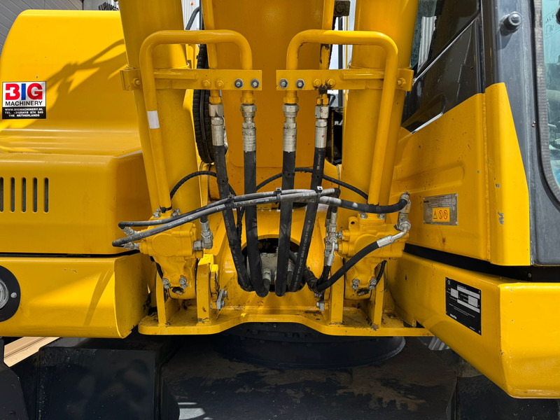 Pelle sur pneus Komatsu PW180-11: photos 16