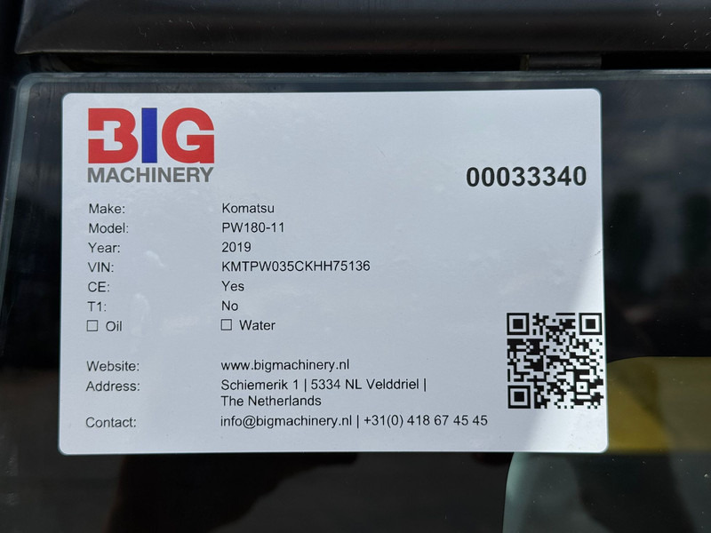 Pelle sur pneus Komatsu PW180-11: photos 9